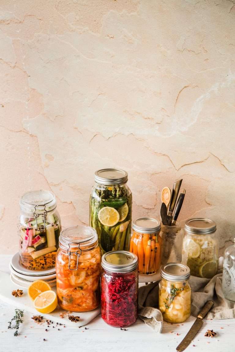 vegetables and fruits in glass jars