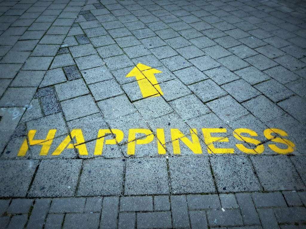 happiness with arrow pointing forward