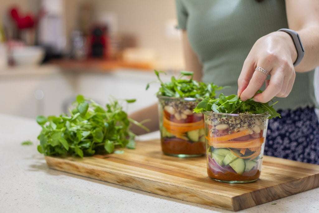 veggie cups being made by a person